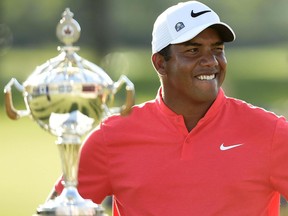 Jhonattan Vegas winks towards his wife following his win at the Canadian Open on July 30.