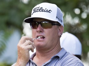 Charley Hoffman chews on a tee on the 16th tee box during the third round of PGA Tour's Canadian Open at Glen Abbey on Saturday, July 29, 2017.