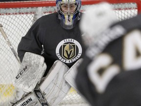 Goalie Jiri Patera keeps his eyes on the puck during the Vegas Golden Knights' NHL hockey development camp at Las Vegas Ice Center in Las Vegas on Thursday, June 29, 2017. (Bizuayehu Tesfaye/Las Vegas Review-Journal via AP)