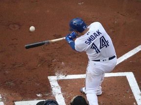 Toronto Blue Jays 1B Justin Smoak singles against the Houston Astros on July 6.