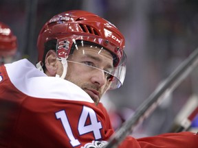 FILE - In this Jan. 13, 2017, file photo, Washington Capitals right wing Justin Williams (14) looks on during the third period of an NHL hockey game against the Chicago Blackhawks in Washington. The Carolina Hurricanes opened free agency Saturday, Jauly 1, 2017,  by bringing back 35-year-old forward Justin Williams on a two-year deal worth $9 million.  (AP Photo/Nick Wass, File)