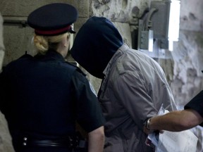 Christopher Husbands arrives in court in Toronto on Monday, June 4, 2012. An appeal court has overturned Christopher Husbands' convictions.