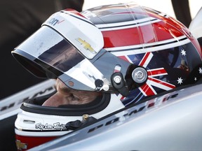 Will Power, of Australia, sits in his car during practice for the IndyCar Series auto race Saturday, July 8, 2017, at Iowa Speedway in Newton, Iowa. (AP Photo/Charlie Neibergall)