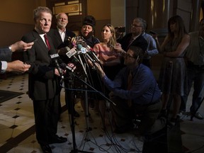 Illinois House Speaker Michael Madigan, D-Chicago, speaks with reporters after a leaders meeting at the Capitol, Monday, July 3, 2017, in Springfield, Ill. Madigan said he would work to override Gov. Bruce Rauner's veto of the tax hike that passed the House on Sunday. (Ted Schurter/The State Journal-Register via AP)