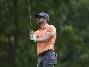 Patrick Rodgers hits a shot from the ninth fairway during the second round of the John Deere Classic golf tournament Friday, July 14, 2017, at TPC Deere Run in Silvis, Ill. (Brian Achenbach/QCOnline.com via AP)