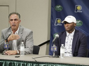 Indiana Pacers general manager Kevin Pritchard, left, speaks as Victor Oladipo listens during a news conference Friday, July 7, 2017, in Indianapolis. (AP Photo/Darron Cummings)