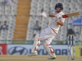 FILE -  A Tuesday, Nov. 29, 2016 file photo of England's Joe Root playing a shot on the fourth day of their third cricket test match against India in Mohali, India. The prospect of both teams being under new captains adds extra intrigue _ and a slight air of unpredictability _ to the first test of England's four-match series against South Africa, when England hopes to settle quickly under Joe Root and nurture early signs of dominance over the Proteas this summer. (AP Photo/Altaf Qadri, File)