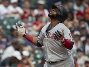 Cleveland Indians Carlos Santana celebrates after hitting a two-run home run in the seventh inning against the Detroit Tigers in the first baseball game of a doubleheader in Detroit, Saturday, July 1, 2017. (AP Photo/Rick Osentoski)