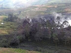 Smoke billows from Sileri Crater after it erupted in Dieng, Central Java, Indonesia, Sunday, July 2, 2017.