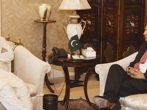In this photo released by Pakistan's Press Information Department, Friday, July 7, 2017, Pakistani Interior Minister Chaudhry Nisar Ali Khan, left, meets Vice President of Facebook Joel Kaplan in Islamabad, Pakistan. Pakistan???s interior ministry says that Kaplan has met with a Khan to apprise him about steps taken by popular networking site to remove content which authorities in this Islamic nation claim is against Islam. (Press Information Department via AP)