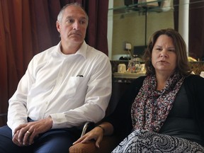 Cynthia, right, 53, and Charles Lewellen, 53, speak during an interview in Amman, Jordan on Monday, July 10, 2017 after attending a hearing in the trial into the killing of their son Staff Sgt. Matthew Lewellen on Nov. 4, 2016 at a Jordanian air base along with two other American Green Berets. The bereaved parents are disappointed in the military judge's refusal to make public a surveillance video from the incident as well as testimony from an American special forces operator at the scene. (AP Photo/Sam McNeil)