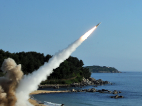 A MGM-140 Army Tactical Missile is fired into the East Sea during a South Korea-US joint missile drill aimed at countering North Korea's ICBM test.