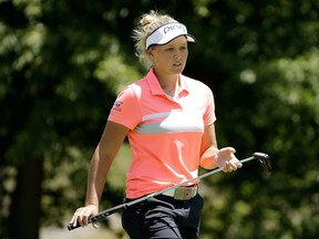 Brooke Henderson walks across the fourth green at the Women's PGA Championship on July 2.