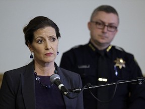 FILE - In this May 13, 2016 file photo, Oakland Mayor Libby Schaaf, left, speaks beside then-Oakland Chief of Police Sean Whent in Oakland, Calif. A federal judge has summoned lawyers for Oakland to court Monday July 10, 2017,to explain the city's mishandling of a police sexual misconduct investigation that led to the chief's resignation and implicated two dozen officers throughout the San Francisco Bay Area. The scandal surrounding accusations that officers exploited an underage prostitute also scuttled the city's attempt to get out from under 15 years of federal court supervision. (AP Photo/Ben Margot, File)