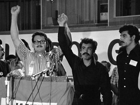 In this Sept. 4, 1972 file photo, Jose A. Gutierrez, left, of Texas, and Rodolfo "Corky" Gonzalez of Colorado, stand before the La Raza Unida Party national convention in El Paso, Texas. The term la raza has deep roots in Mexico after that country's revolution and in the U.S. Chicano Movement of the 1970s which helped elect some of the nation's first Latinos to public office. But in the ever-evolving discussions of race and ethnicity in the U.S., some Latino advocates see the term as outdated and no longer useful in an era of a more racially diverse society and President Donald Trump. (AP Photo/Ferd Kaufman, File)