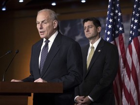 FILE - In this June 29, 2017, file photo, Homeland Security Secretary John Kelly, left, joins House Speaker Paul Ryan, R-Wis., as the Republican-led House pushes ahead on legislation to crack down on illegal immigration, during a news conference at the Capitol in Washington. Kelly will speak Wednesday, July 19 on the opening day of the Aspen Security Forum in Aspen, Colo. The event brochure says he'll explain "how he is grappling with the challenge and the Trump administration's plans for meeting it." (AP Photo/J. Scott Applewhite, File)