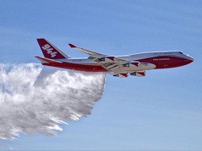 FILE - This May 5, 2016, file photo provided by Global Supertanker Services shows a Boeing 747 making a demonstration water drop at Colorado Springs Airport in Colorado Springs, Colo. Federal officials have given a giant airtanker capable of carrying 19,200 gallons (72,700 liters) approval to fight wildfires in the U.S., but a lack of contracts currently limits the aircraft to California and one county in Colorado. The U.S. Department of Agriculture's Interagency Airtanker Board issued the approval on Tuesday, July 25, 2017. (Hiroshi Ando/Global Supertanker Services via AP, File)