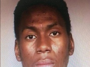 This undated photo provided by the Fresno Police Department shows murder suspect Ibn Lugman Haqq, 21, in Fresno, Calif. Central California police have captured Haqq who escaped from police headquarters after fighting with detectives and fleeing through a window. Details about where and when officers made the capture were not immediately available Thursday morning, July 13, 2017. (Fresno Police Department via AP)