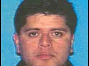 This undated photo released by the Los Angeles Police Department shows suspect Ramon Eduardo Gaspar. Gaspar was a Certified Nurse Assistant (CNA) at Tarzana Medical Center in Encino, Calif. Los Angeles police say the nursing assistant charged with sexually abusing patients has been captured in his native Guatemala after more than a decade on the run. Police said in a statement Wednesday, July 5, 2017, that 48-year-old Ramon Gaspar was arrested and extradited to Southern California on June 26. LAPD investigators had been hunting for Gaspar since he skipped bail in 2006 with his wife and one of his three children. Investigators had been focusing on Guatemala for years. (Los Angeles Police Department via AP)