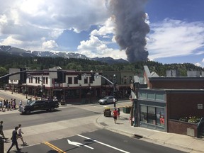 This Wednesday, July 5, 2017, photo provided by Tony Cooper shows a wildfire burning near Breckenridge, Colo. Firefighters were working Thursday to keep a wildfire that's forced the evacuation of hundreds of people from spreading toward homes near Colorado's Breckenridge Ski Resort and the nearby historic town. (Tony Cooper via AP)
