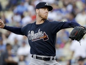 Atlanta Braves starting pitcher Mike Foltynewicz throws against the Los Angeles Dodgers during the first inning of a baseball game in Los Angeles, Thursday, July 20, 2017. (AP Photo/Chris Carlson)