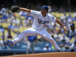 Los Angeles Dodgers starting pitcher Clayton Kershaw throws to the plate during the first inning of a baseball game against the Kansas City Royals, Sunday, July 9, 2017, in Los Angeles. (AP Photo/Mark J. Terrill)