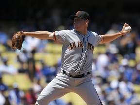 San Francisco Giants starting pitcher Ty Blach throws to the plate during the first inning of a baseball game against the Los Angeles Dodgers, Saturday, July 29, 2017, in Los Angeles. (AP Photo/Mark J. Terrill)