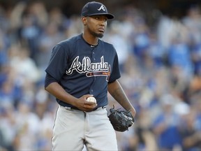 Atlanta Braves starting pitcher Julio Teheran waits after Los Angeles Dodgers' Chase Utley hit a solo home run during the third inning of a baseball game, Saturday, July 22, 2017, in Los Angeles. (AP Photo/Ryan Kang)