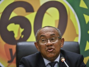 FILE - A Thursday, March 16, 2017 file photo of New president of the African soccer confederation Ahmad of Madagascar, speaking at a press conference after being chosen at the general assembly of the Confederation of African Football (CAF) in Addis Ababa, Ethiopia. African soccer's biggest tournament could be moved from the start of the year to the European summer months of June and July, with the number of teams being increased from 16 to 24. The proposals for the future of the African Cup of Nations were made at a two-day meeting Tuesday and Wednesday in Rabat, Morocco, hosted by the Confederation of African Football. (AP Photo/File)