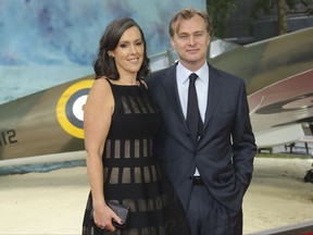 Director Christopher Nolan, right, and Emma Thomas pose for photographers upon arrival at the World premiere of the film 'Dunkirk' in London, Thursday, July 13th, 2017. (Photo by Joel Ryan/Invision/AP)