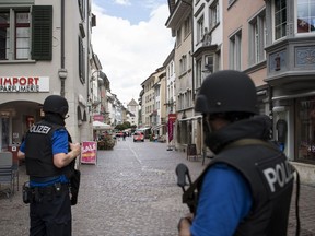 The police shut down the old town of Schaffhausen in Switzerland, while they search for an unknown man who attacked people, on Monday, July 24, 2017.