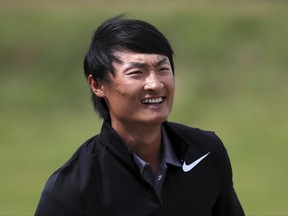 China's Li Haotong celebrates on the 18th during the final round of the British Open Golf Championship, at Royal Birkdale, Southport, England, Sunday July 23, 2017. (Peter Byrne/PA via AP)