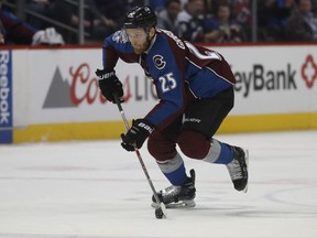 FILE - A Sunday, March 5, 2017, file photo of Colorado Avalanche center Mikhail Grigorenko in the first period of an NHL hockey game in Denver. Former Colorado Avalanche center Mikhail Grigorenko has returned to Russia, signing with Kontinental Hockey League club CSKA Moscow. Grigorenko had been an unrestricted free agent in the NHL after his contract with Colorado expired. (AP Photo/David Zalubowski, File)