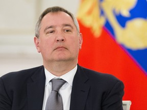 FILE - This is a Tuesday, April 5, 2016  file photo of Russia's Deputy Prime Minister Dmitry Rogozin attends a meeting of a committee on preparations for Victory Day in WWII, which Russia celebrates on May 9, in the Kremlin in Moscow, Russia. Rogozin said that he had to scrap a trip to Moldova after his plane was barred from entering Romanian and Hungarian airspace. Rogozin said in comments to Russian news agencies on Friday July 28, 2017, that he and other Russian officials were traveling on a commercial flight to the Moldovan capital Chisinau when the plane was denied passage over Romania or Hungary. (AP Photo/Alexander Zemlianichenko, pool)