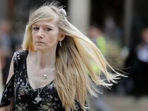 FILE- In this file photo dated Wednesday, July 26, 2017, Connie Yates, mother of critically ill baby with a rare genetic disease Charlie Gard arrives at the Royal Court of Justice in London.  British media are reporting a family announcement that 11-month old Charlie Gard, has died Friday July 28, 2017. (AP Photo/Frank Augstein, FILE)