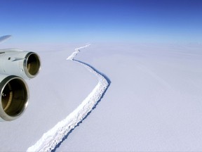 This Nov. 10, 2016 aerial photo released by NASA, shows a rift in the Antarctic Peninsula's Larsen C ice shelf