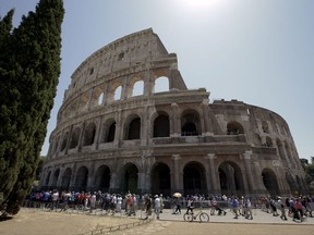 FILE - In this Friday, July 1st, 2016 file photo, a view of the Colosseum after the first stage of the restoration work was completed in Rome. Italy's culture minister says the international search for a new director for Rome's Colosseum resumes after a challenge by the city was overruled by a tribuna (AP Photo/Andrew Medichini, File)
