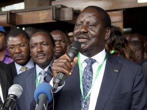 FILE - In this file photo dated Sunday, May 28 2017, National Super Alliance (NASA) Presidential candidate Raila Odinga, addresses supporters after he presented his presidential papers in Nairobi, Kenya, Sunday, May 28 2017.  Odinga has been taken to the hospital with suspected food poisoning, according to a spokesman Sunday July 9, 2017. (AP Photo/Sayyid Abdul Azim, FILE)