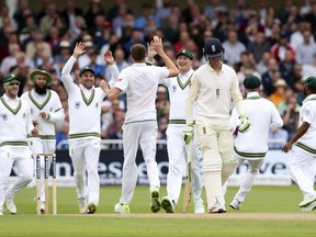 South Africa players celebrate the wicket of England's Keaton Jennings during day two of the Second Test match at Trent Bridge, Nottingham, England, Saturday, July 15, 2017. (Nick Potts/PA via AP)