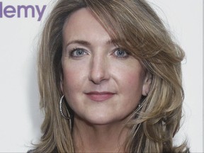 FILE- In this file photo dated May 13, 2013, BBC TV journalist and presenter Victoria Derbyshire poses for photographers in London.   Several prominent women at the BBC, including Derbyshire have written an open letter Sunday July 23, 2017,  to BBC Director-General Tony Hall saying documents released last week confirmed that "women at the BBC are being paid less than men for the same work."  and said they want the broadcaster's gender pay gap to be resolved now rather than in several years. (Yui Mok/PA File via AP)