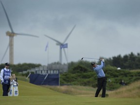 Matt Kuchar of the United States plays his second shot at the 5th hole during day three of the Scottish Open golf tournament at Dundonald Links, Troon, Scotland, Saturday, July 15, 2017. (Mark Runnacles/PA via AP)