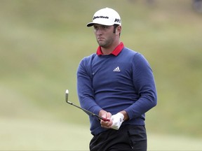 Spain's Jon Rahm during day four of the Irish Open golf tournament at Portstewart Golf Club, Northern Ireland, Sunday July 9, 2017.  Rahm, one of the hottest young players in world golf, holed out from 150 yards for eagle on No. 4 and strung together four straight birdies from No. 7 to turn what was promising to be a tight final day into a procession to win the tournament Sunday.  (Niall Carson(/PA via AP)