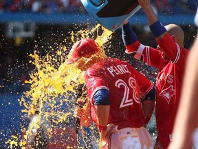 Toronto Blue Jays LF Steve Pearce is doused with Gatorade on July 30.