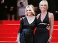 Madonna and Sharon Stone pose as they arrive at the Festival Palace during the 61st Cannes International Film Festival on May 21, 2008 in Cannes, southern France. Can you feel the friendship?!