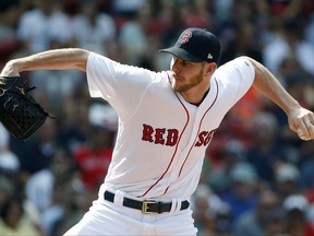 Boston Red Sox's Chris Sale pitches during the first inning of a baseball game against the New York Yankees in Boston, Saturday, July 15, 2017. (AP Photo/Michael Dwyer)
