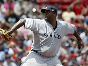 New York Yankees' CC Sabathia pitches during the first inning of the first game of a baseball doubleheader against the Boston Red Sox in Boston, Sunday, July 16, 2017. (AP Photo/Michael Dwyer)
