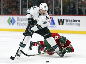 FILE - In this March 21, 2017, file photo, San Jose Sharks' Patrick Marleau (12) gains control of the puck against Minnesota Wild's Jared Spurgeon (46) in the second period of an NHL hockey game in St. Paul, Minn. Marleau has left the Sharks and signed an $18.75 million, three-year deal with the Toronto Maple Leafs.(AP Photo/Stacy Bengs)