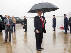 President Donald Trump speaks with reporters after firing Chief of Staff Reince Priebus and naming Secretary of Homeland Security John Kelly as his new Chief of Staff, Friday, July 28, 2017, in Andrews Air Force Base, Md. (AP Photo/Evan Vucci)