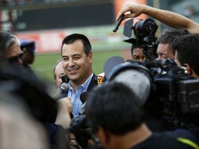Dan Duquette, Baltimore Orioles executive vice president of baseball operations, speaks with members of the media before a baseball game against the Kansas City Royals in Baltimore, Monday, July 31, 2017. The Orioles announced Monday that they acquired infielder Tim Beckham from the Tampa Bay Rays. (AP Photo/Patrick Semansky)