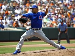 Chicago Cubs starting pitcher Jose Quintana throws to the Baltimore Orioles in the second inning of a baseball game in Baltimore, Sunday, July 16, 2017. (AP Photo/Patrick Semansky)